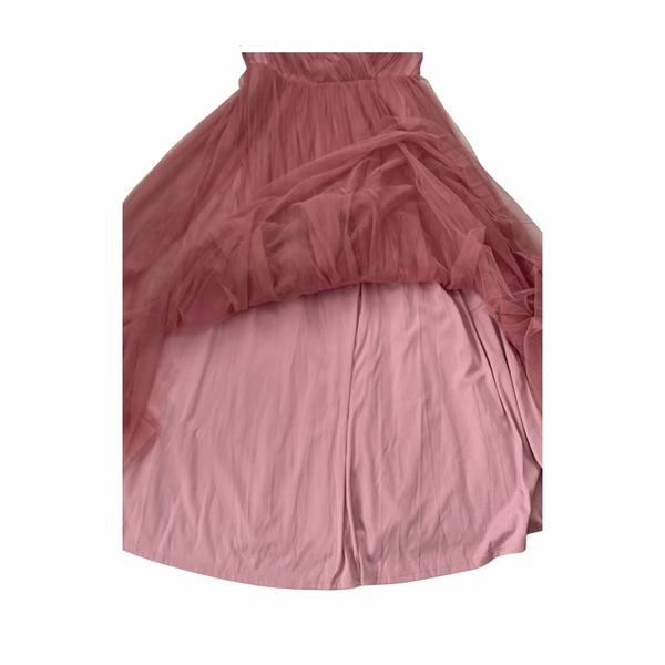 Pink layered dress on a white background