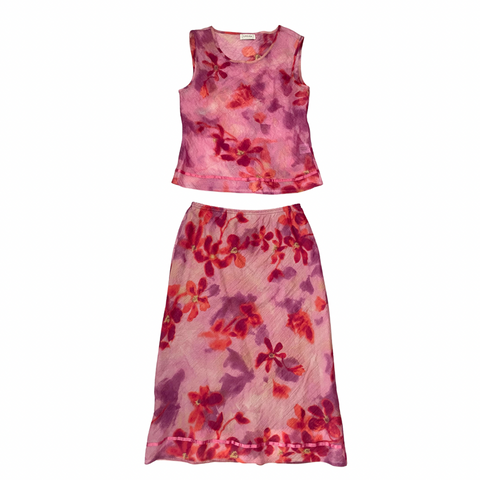 Lemara two-piece floral set with sleeveless top and matching midi skirt in pink, purple, and fuchsia, size M, laid flat.