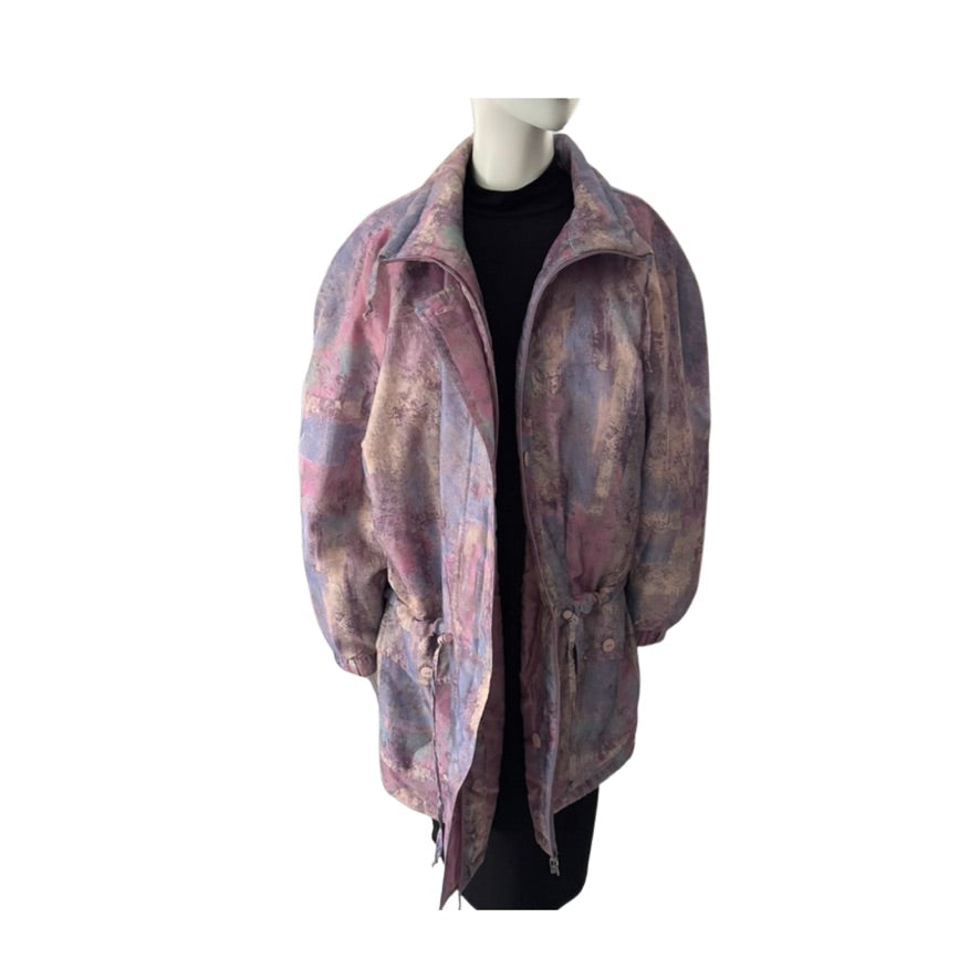 Mannequin wearing a patterned coat on a white background