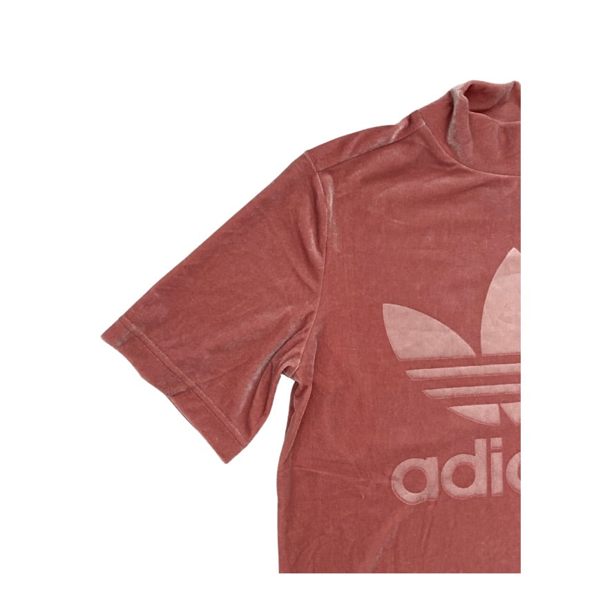 Pink Adidas top on a white background