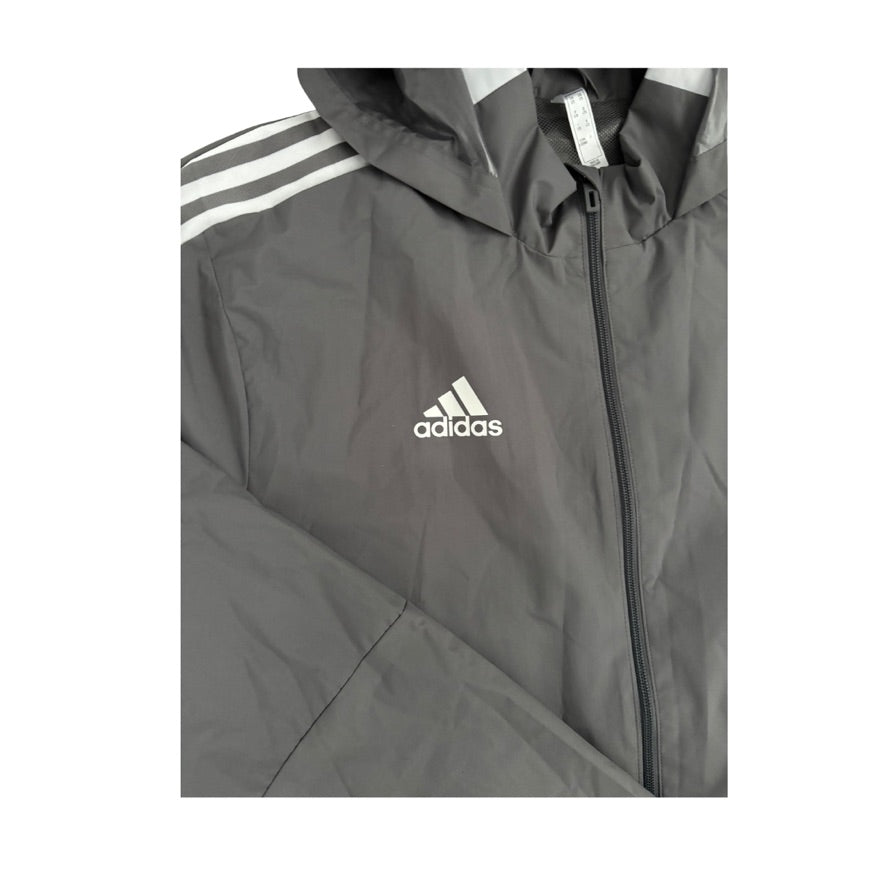 Grey Adidas jacket with a hood on a white background