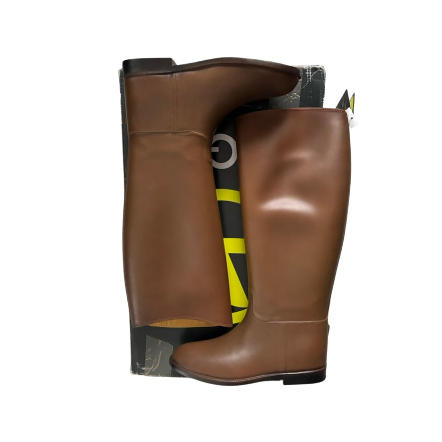 Brown rubber boots with a visible brand logo on a white background