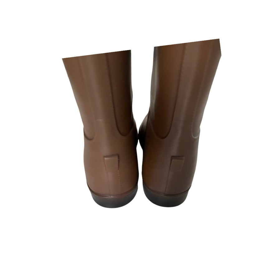 Pair of brown rubber boots on a white background