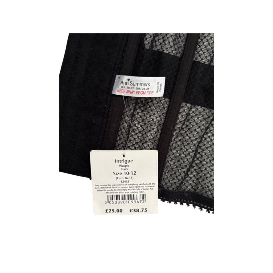 Black and gray patterned fabric with a label on a white background