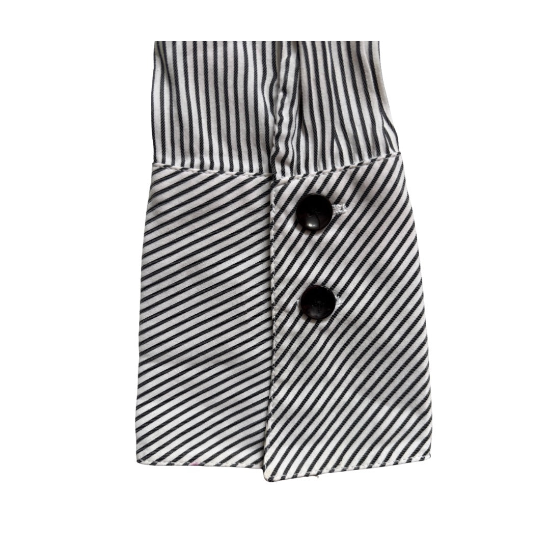 Black and white striped shirt with two buttons on a white background