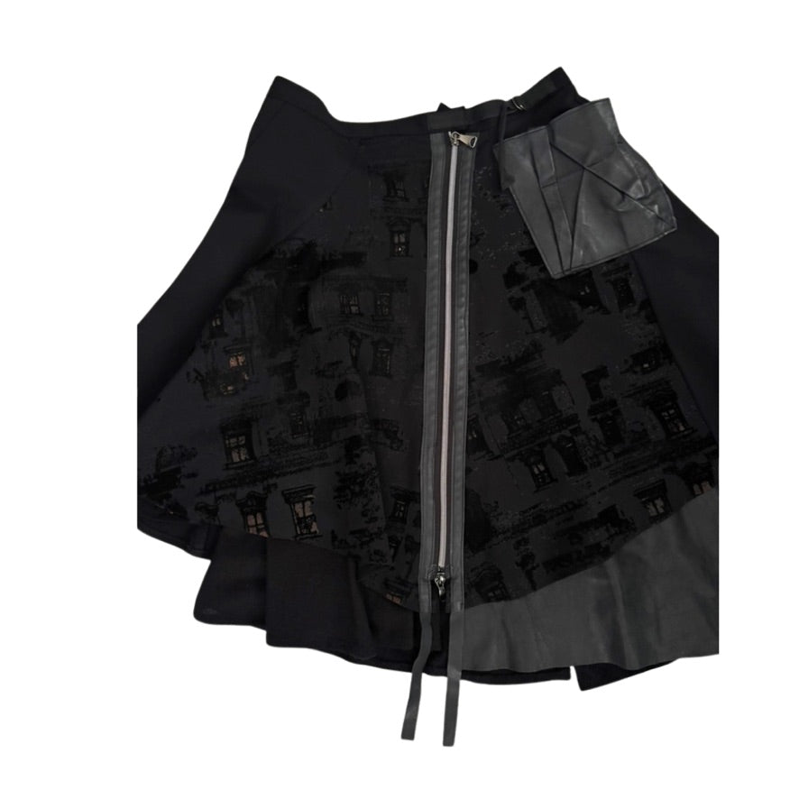 Black skirt with pattern and zipper on a white background