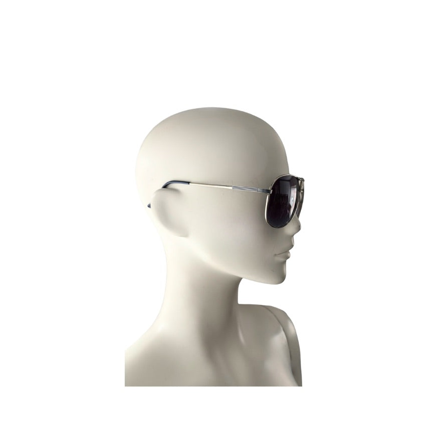 Sunglasses on a mannequin head against a white background