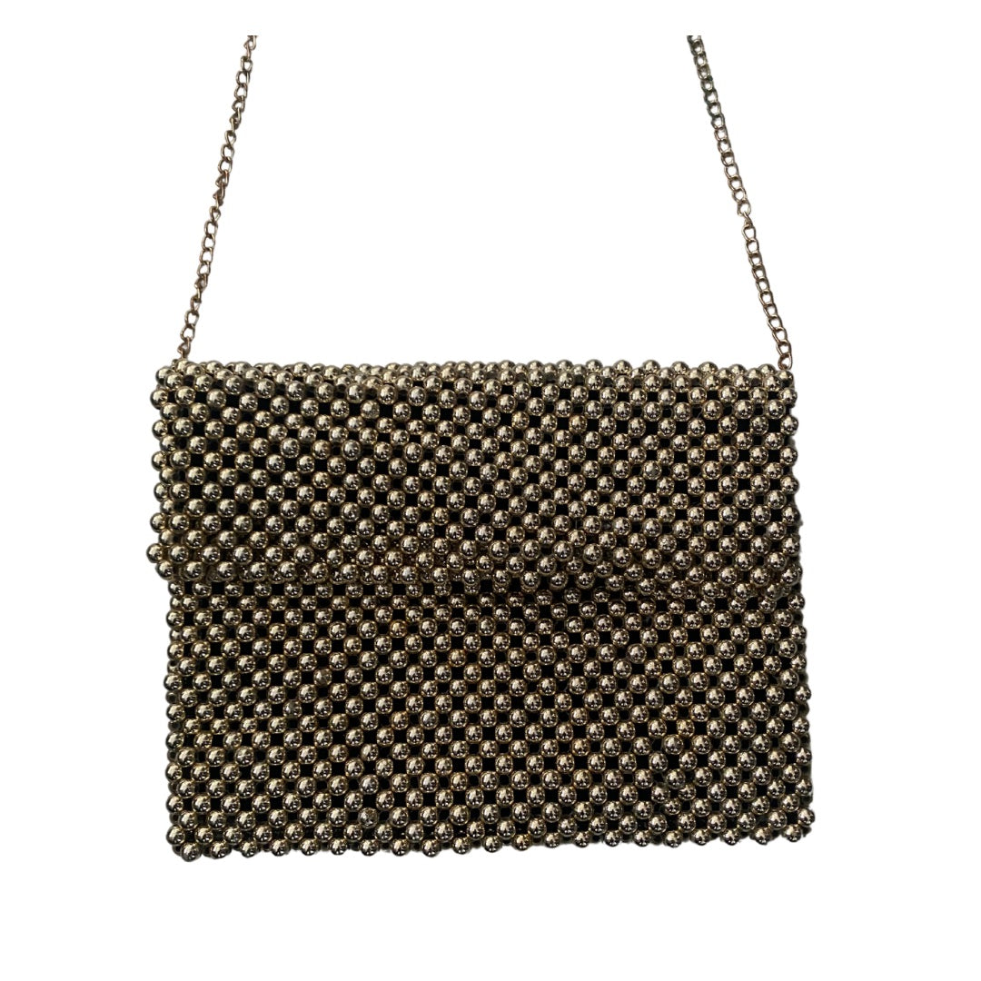 Beaded handbag with chain strap on a white background