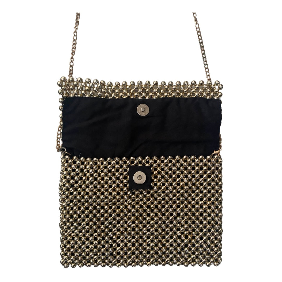 Black handbag with gold beaded detailing on a white background