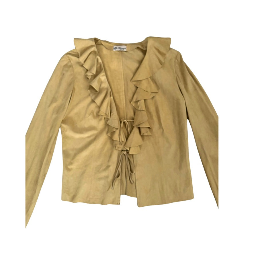 Yellow blouse with ruffled details on a white background