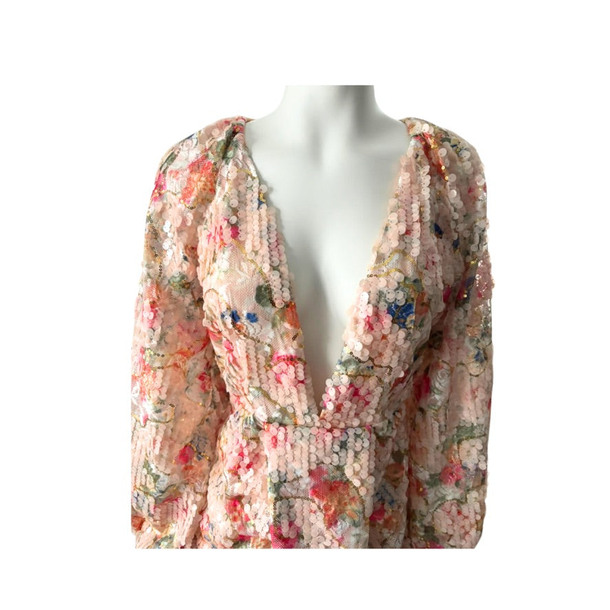 Floral patterned scarf on a mannequin with a white background