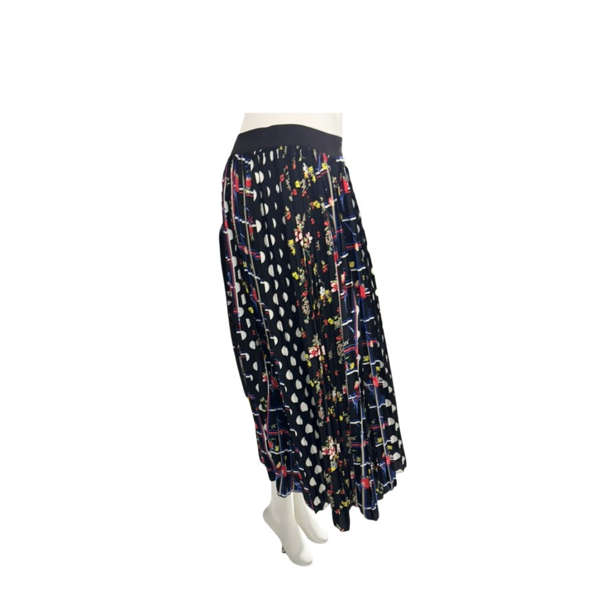 Long patterned skirt on a mannequin against a white background