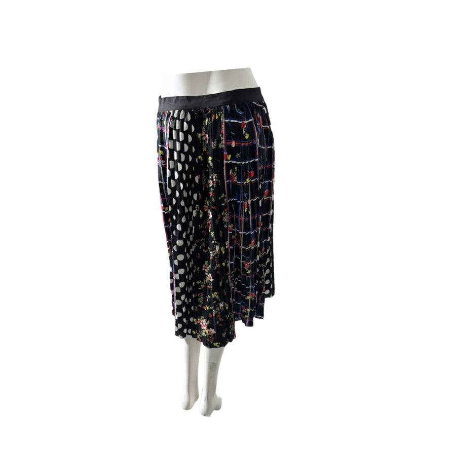 Mannequin wearing a patterned skirt on a white background