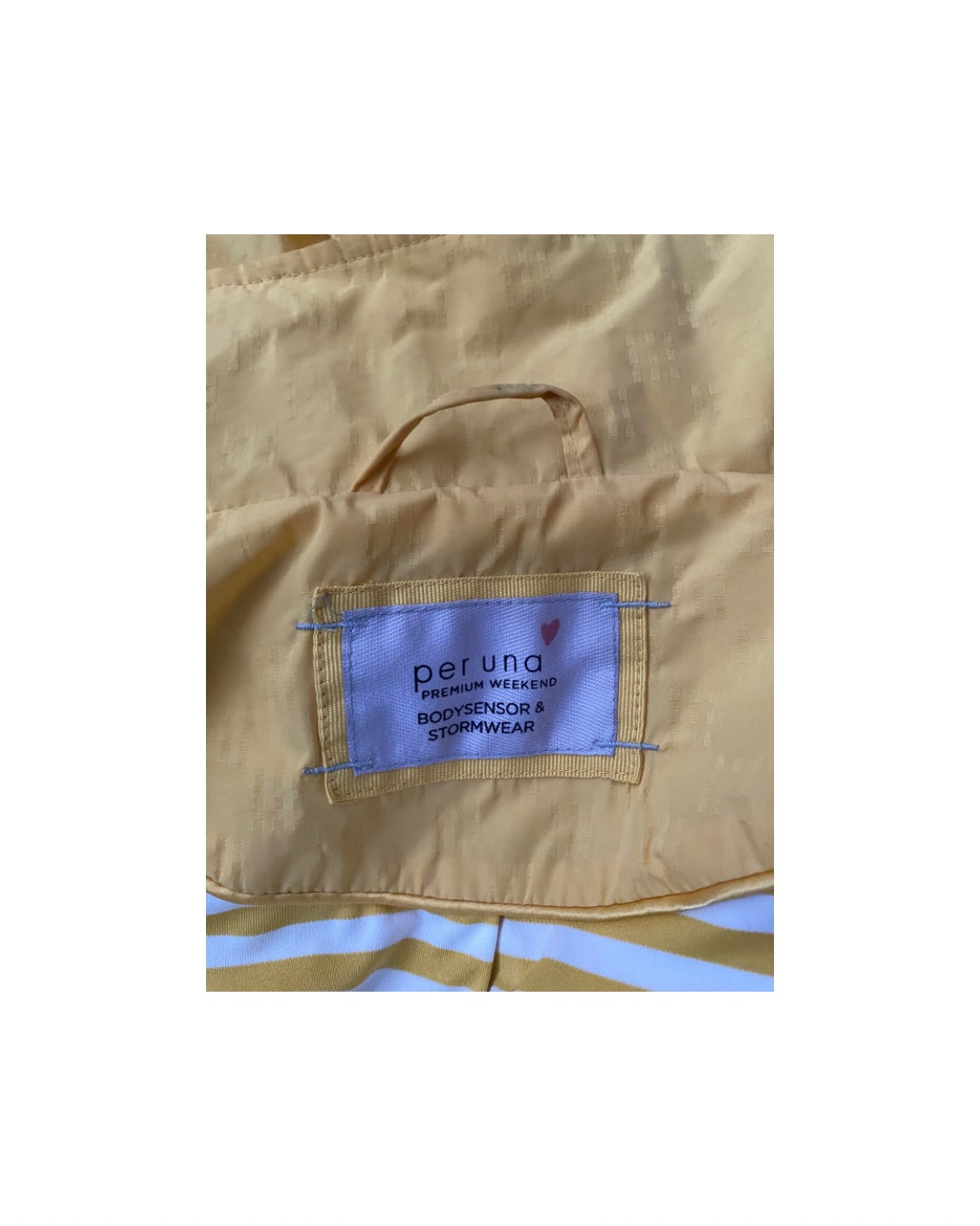 Yellow jacket with a blue label on a white background