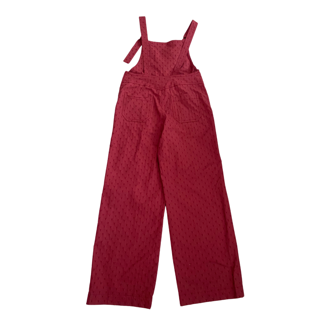 Red patterned jumpsuit on a white background