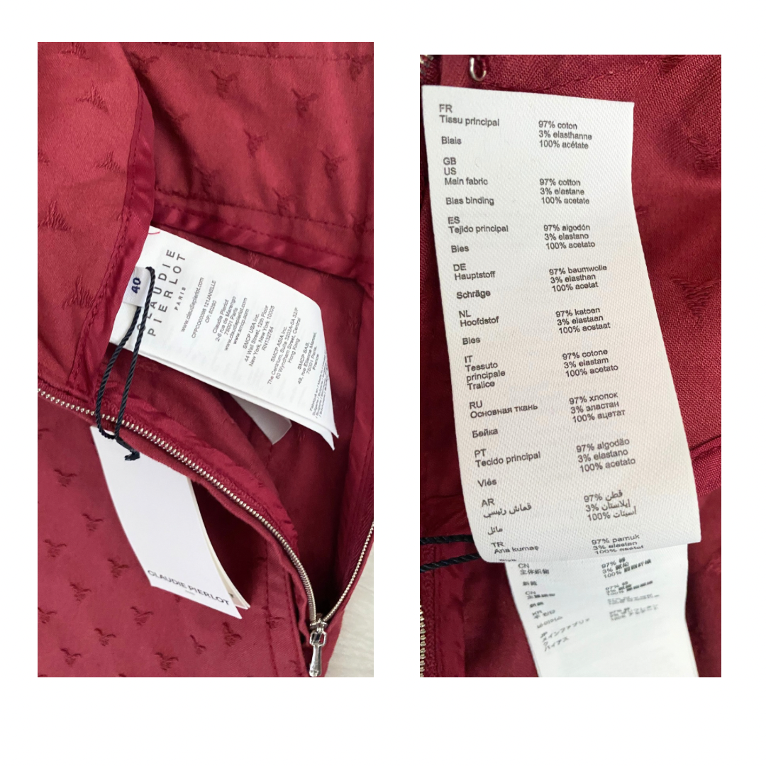 Red jumpsuit tag displaying fabric composition details on a white background