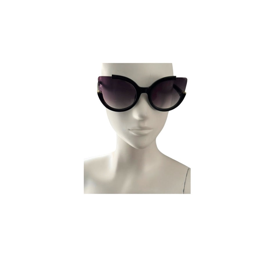Sunglasses on a mannequin head against a white background
