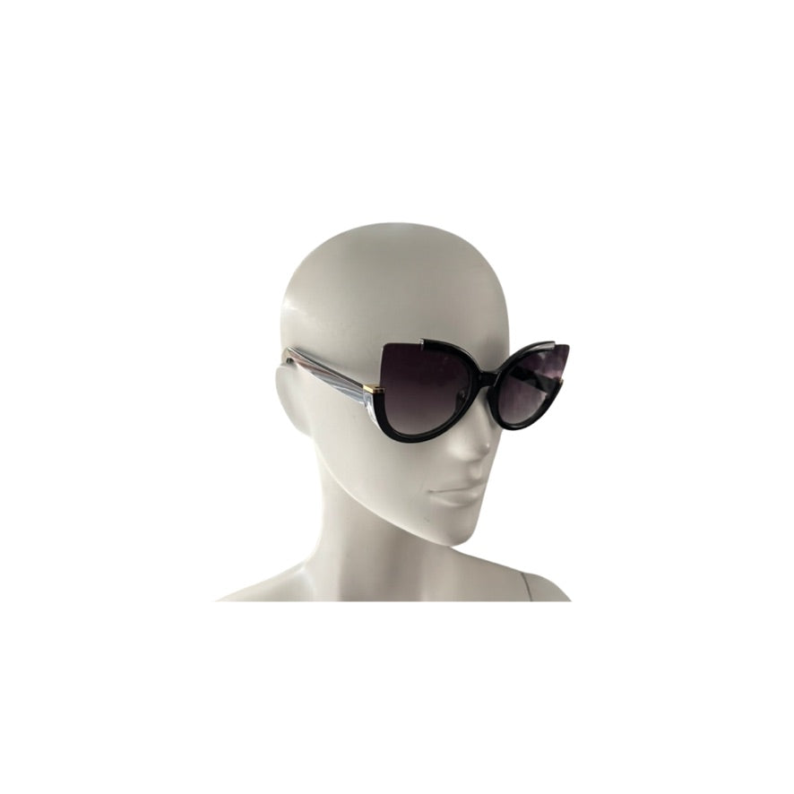Sunglasses on a mannequin head against a white background