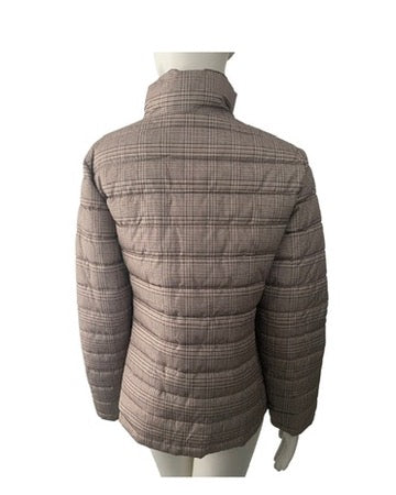 Plaid patterned jacket on a mannequin against a white background