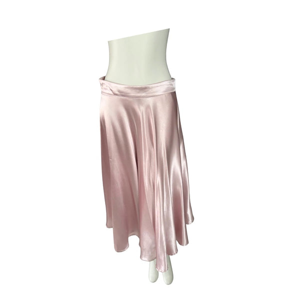 Pink satin skirt on a mannequin against a white background