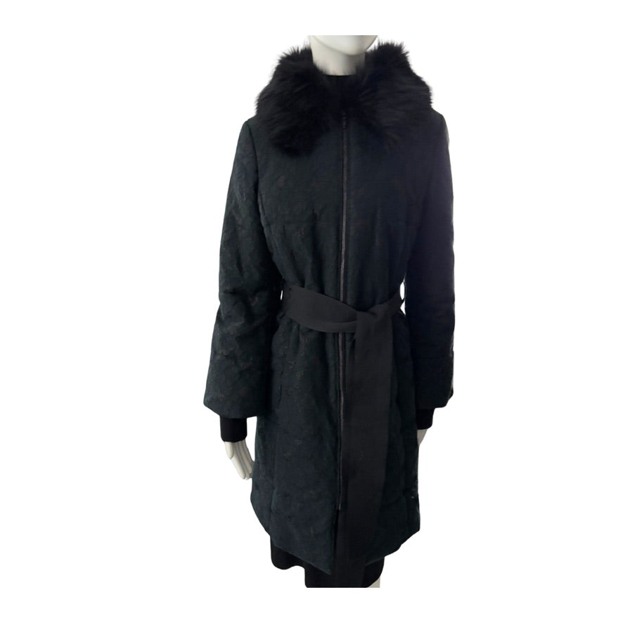 Black coat with fur collar on a mannequin against a white background