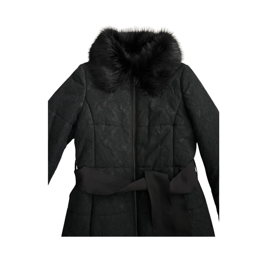 Black coat with fur hood on a white background