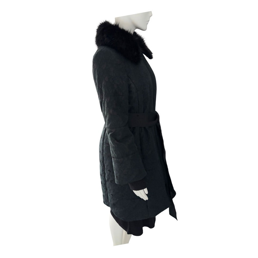 Black coat with fur collar on a mannequin against a white background
