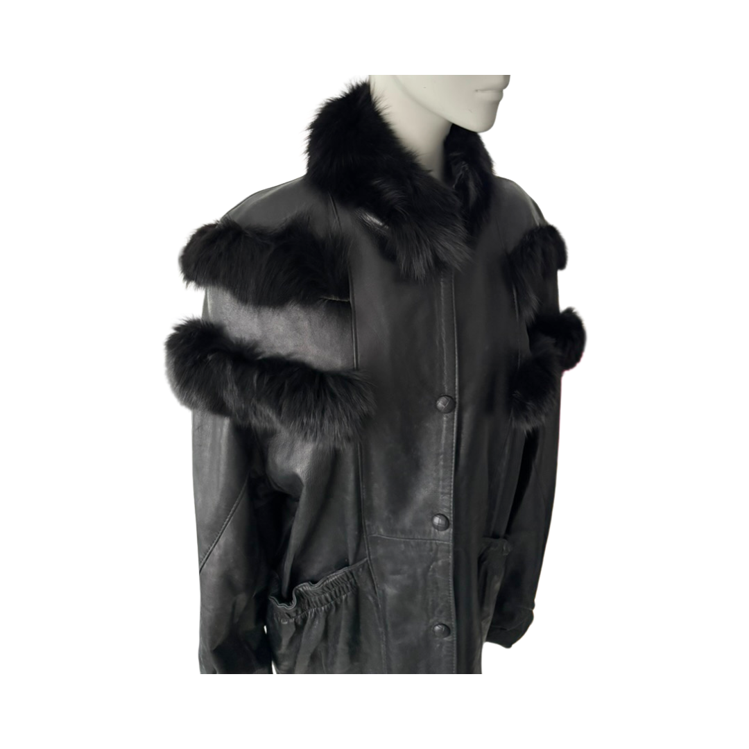 Black leather jacket with fur trim on a mannequin against a white background