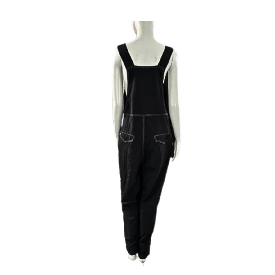 Black overalls on a mannequin against a white background