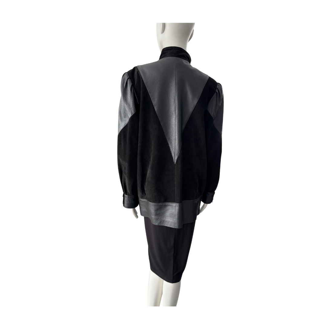 Black and gray jacket on a mannequin against a white background