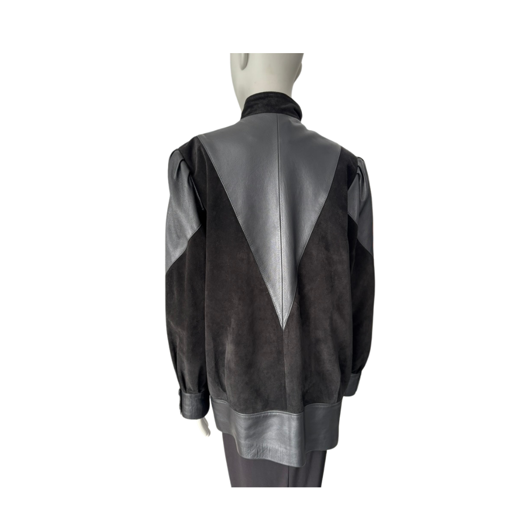 Mannequin wearing a black and gray jacket on a white background
