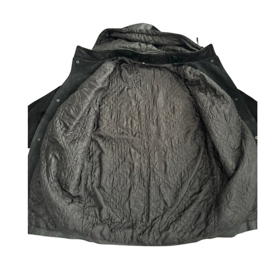 Black quilted jacket lining on a white background