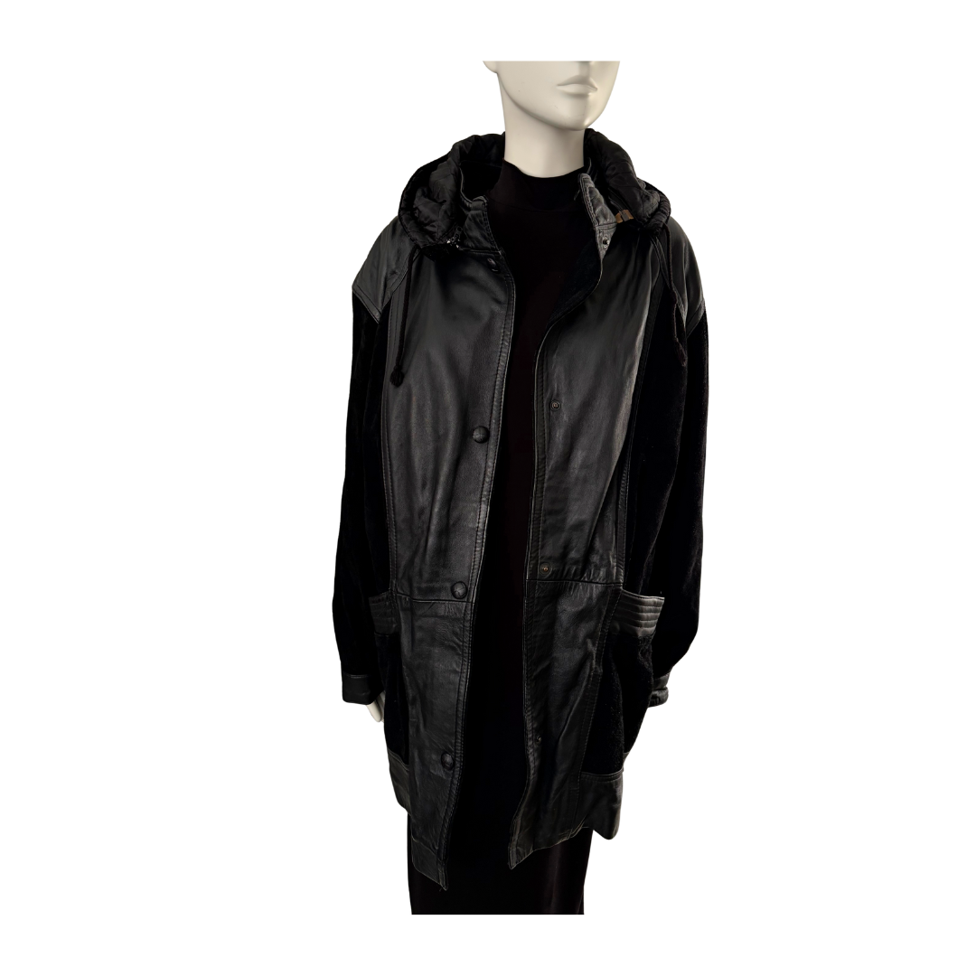 Black raincoat on a mannequin against a white background