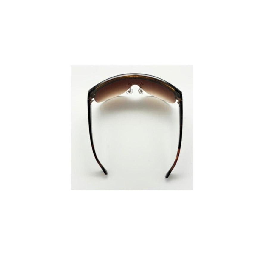 Sunglasses with brown lenses on a white background