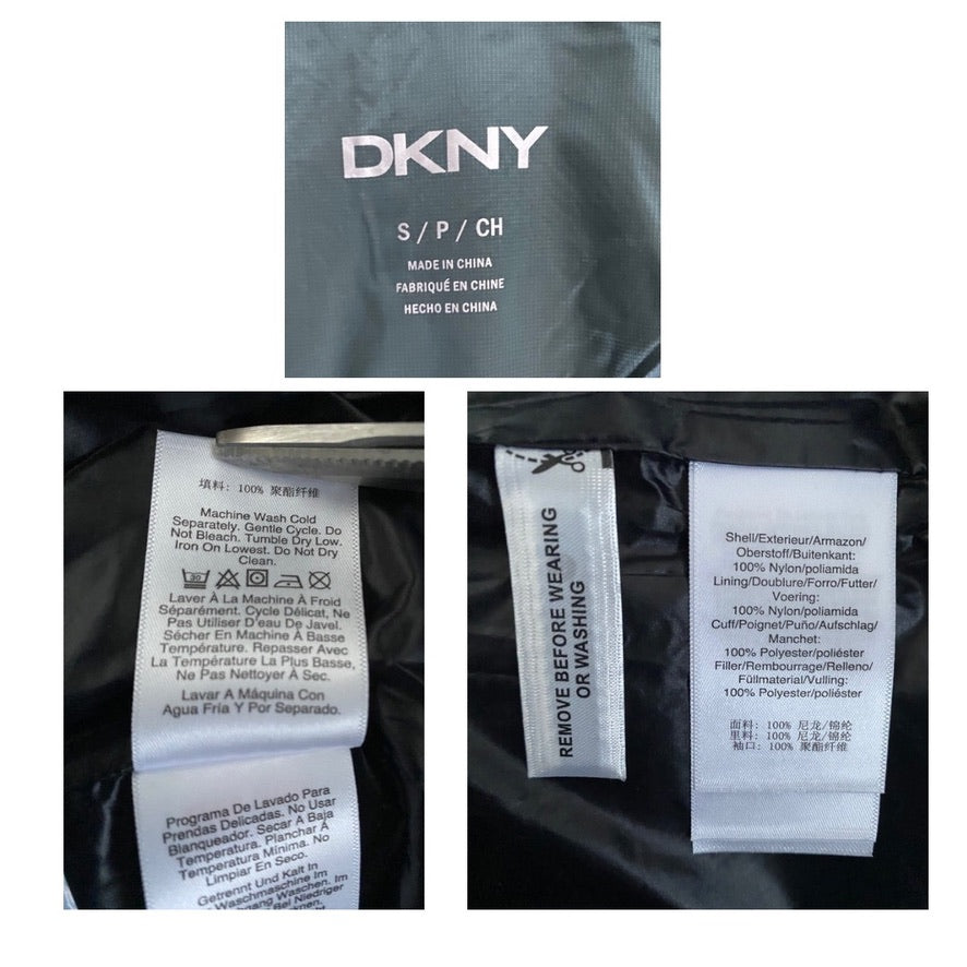 DKNY garment tags with care instructions on a black fabric background