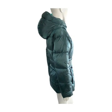 Green puffer coat on a mannequin against a white background