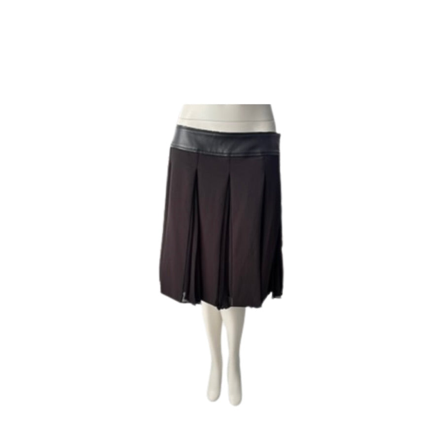 Black skirt with leather trim on a white background