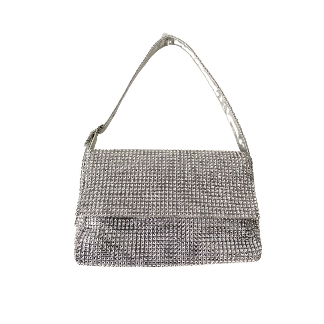 A silver diamanté shoulder bag with a mesh effect and a buckle strap detail. It has a rectangular shape and the bag's flap is visible with a magnetic press stud fastening.