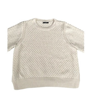 Beige knitted sweater on a white background