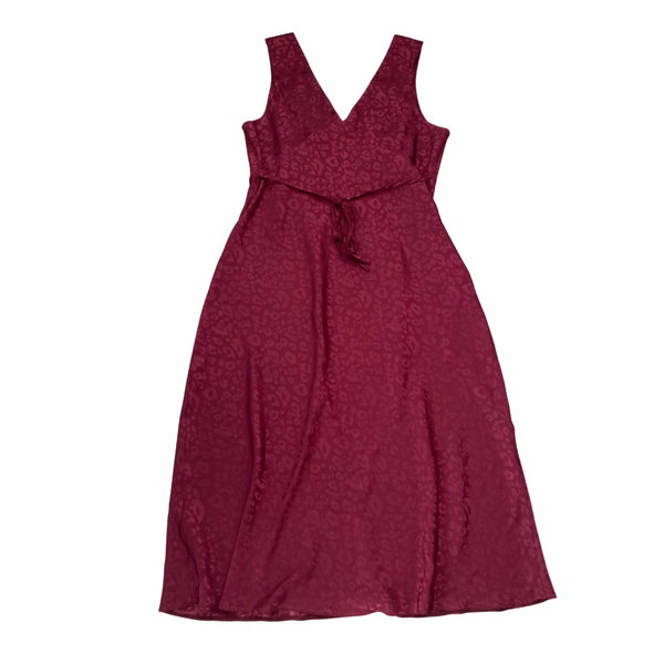 Maroon dress with a tie waist on a white background