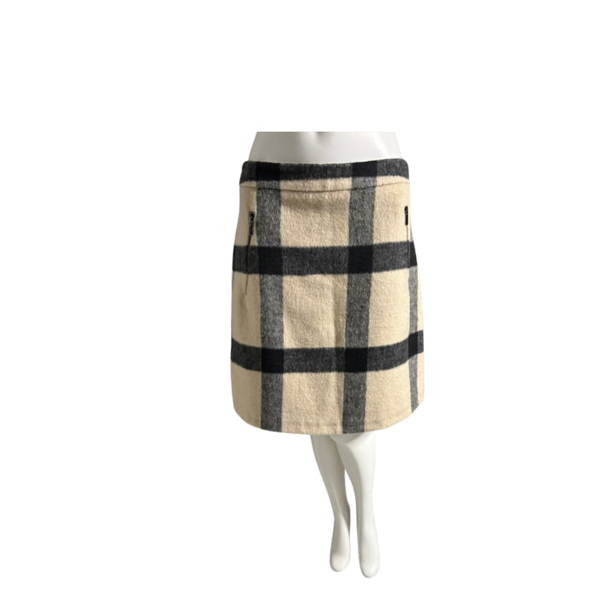 Plaid skirt on a mannequin against a white background