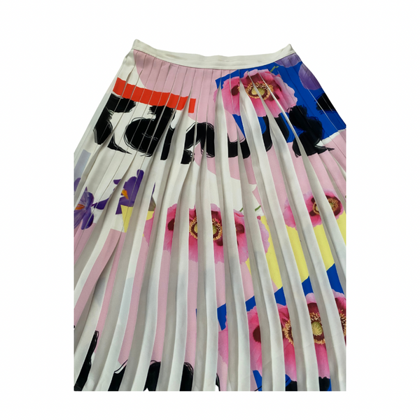 Colorful pleated skirt with abstract patterns on a white background