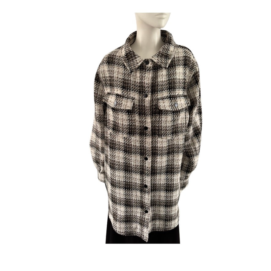 Plaid shirt on a mannequin against a white background