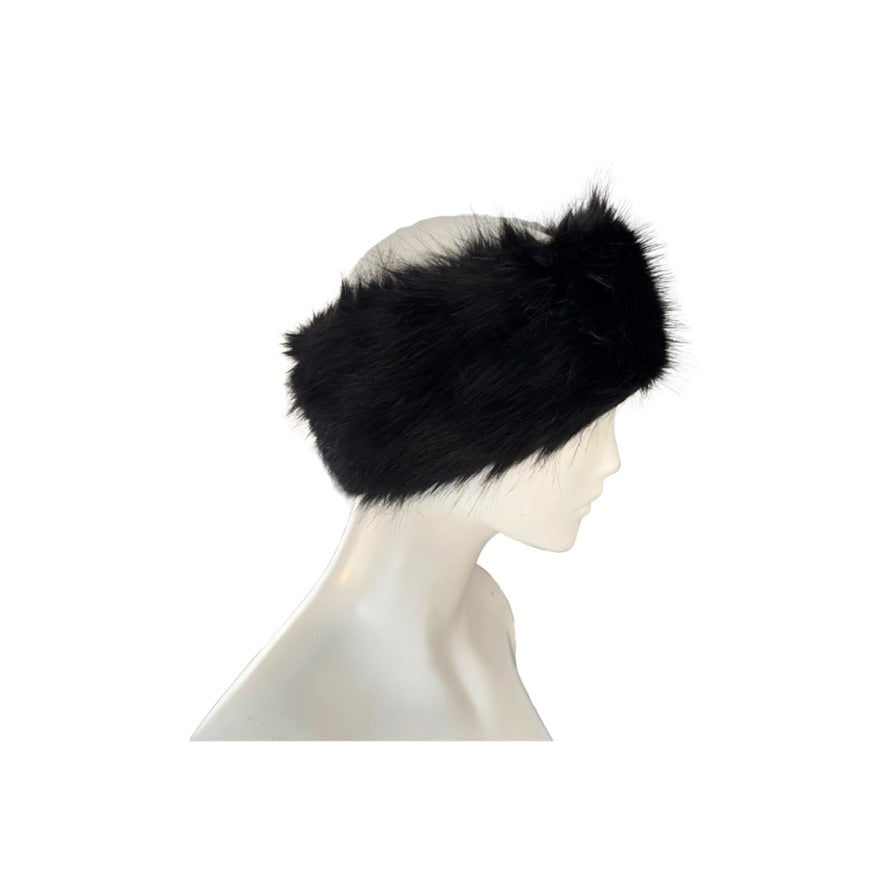 Black fur headband on a mannequin head against a white background