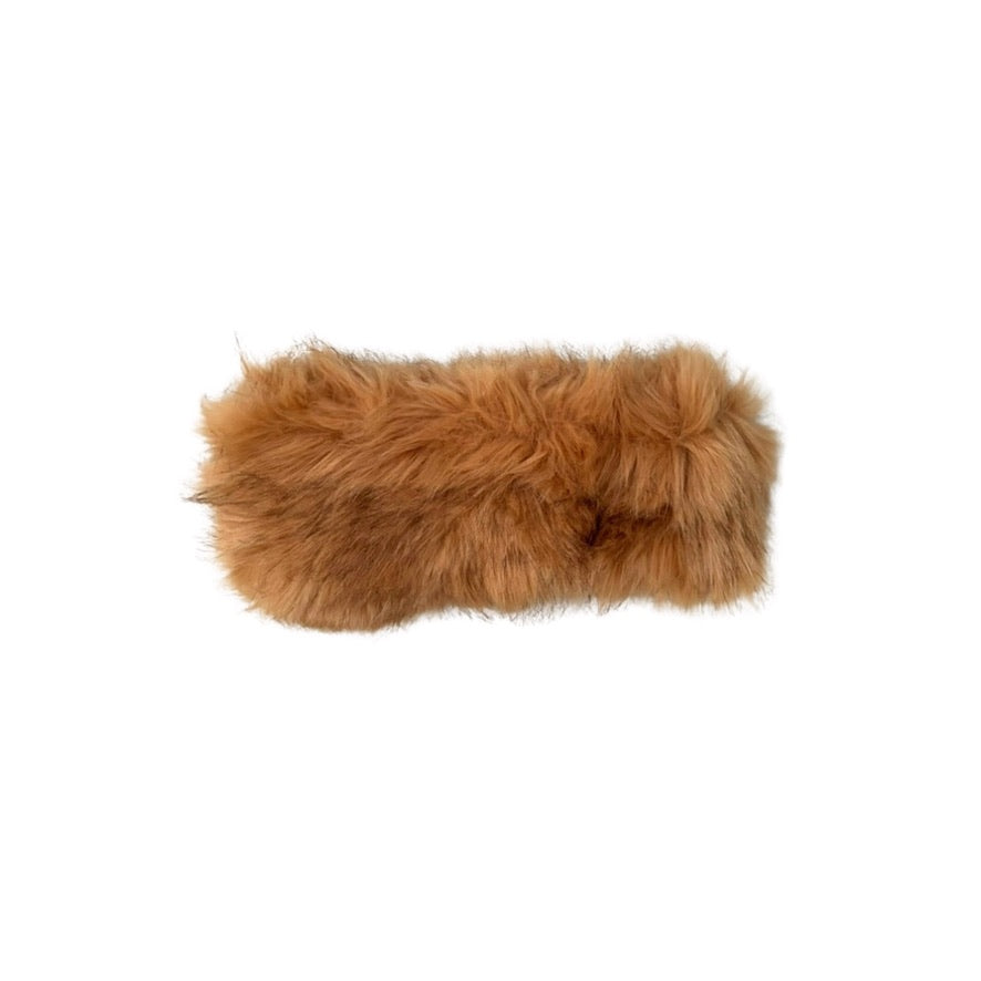 Brown fur headband on a white background