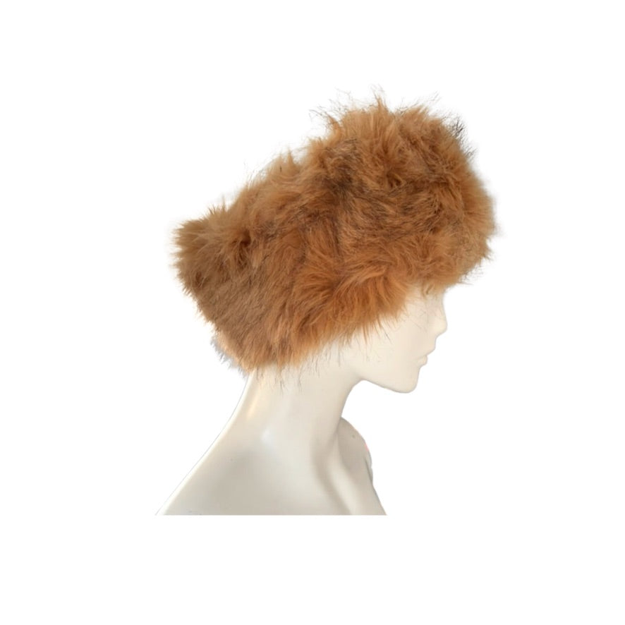 Brown fur headband on a mannequin head against a white background