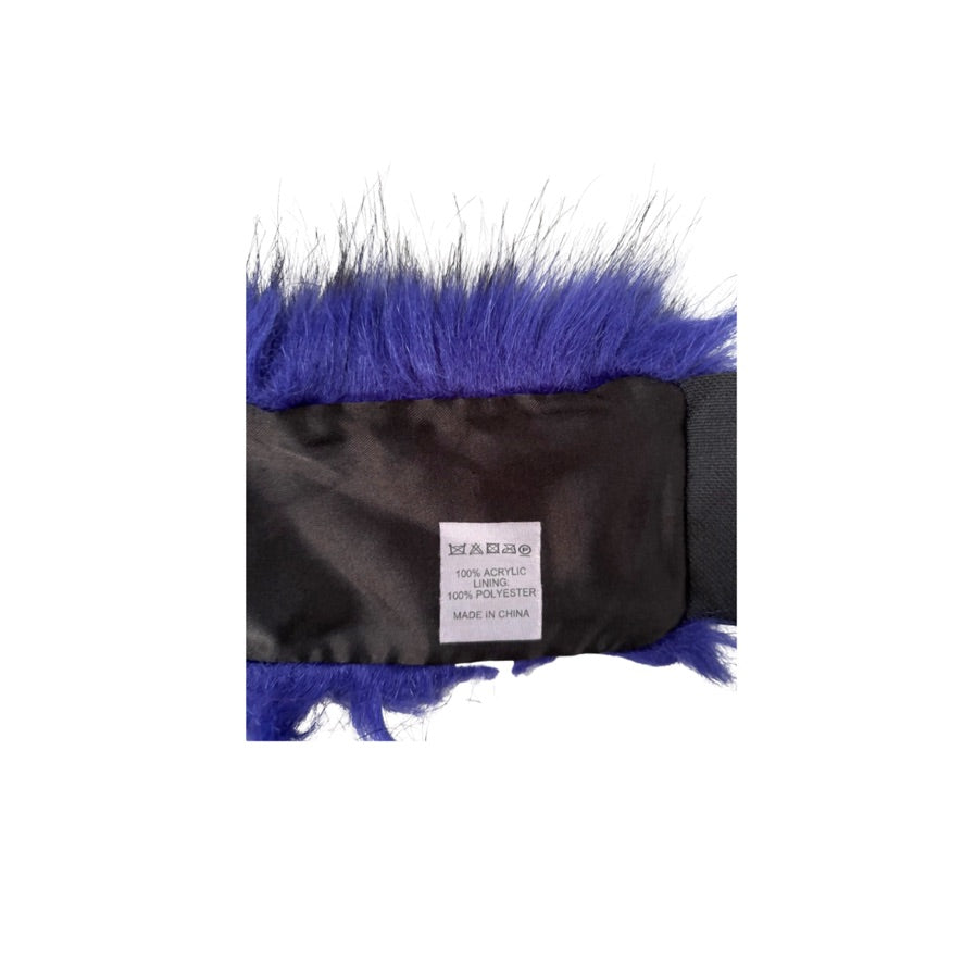 Label on black with purple fur trim material on a white background
