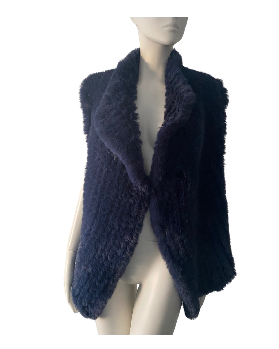 Navy blue knitted vest on a mannequin against a white background