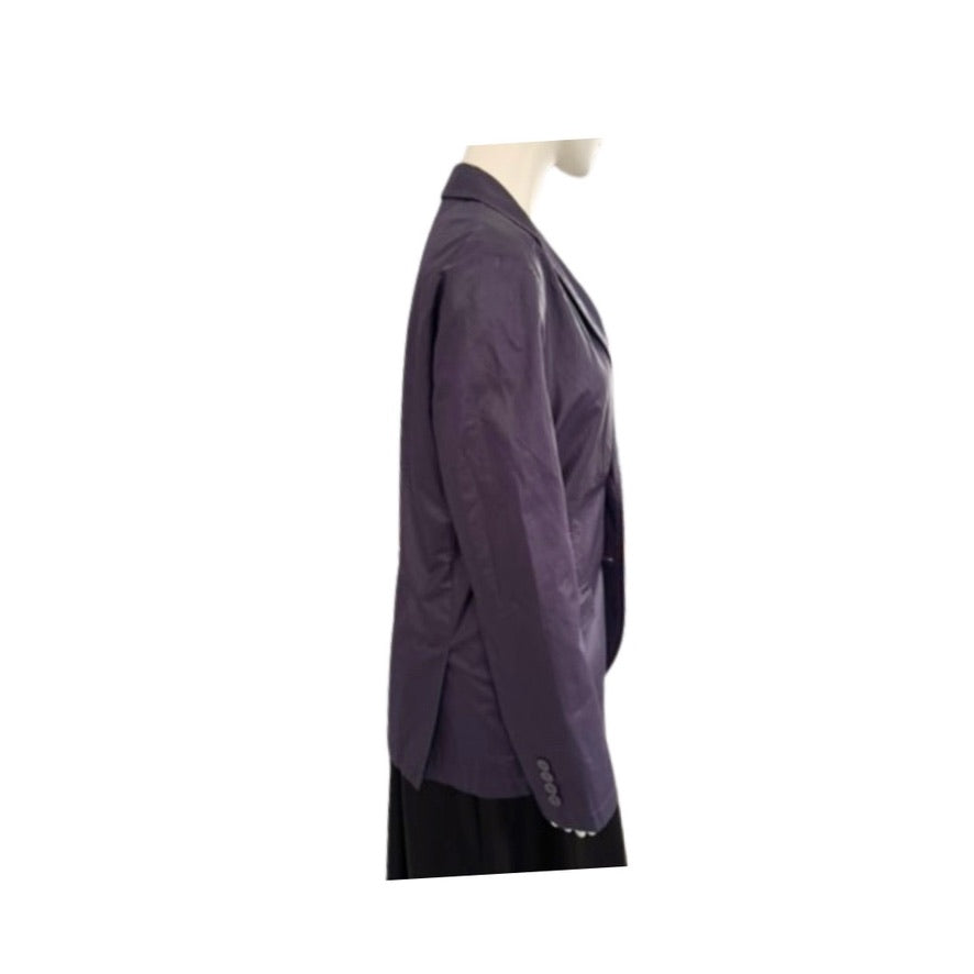 Purple blazer on a mannequin against a white background