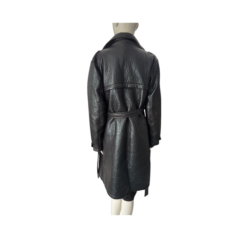 Black textured coat on a mannequin against a white background